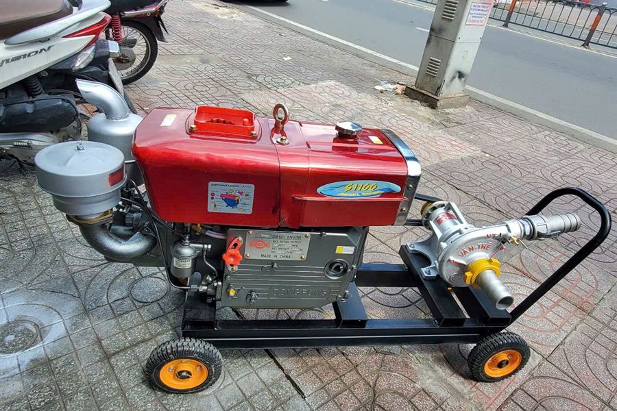 Vùng lúa An Giang · Bơm diesel & máy sấy nguyên container
